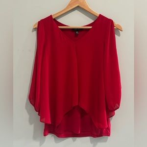 Red blouse.